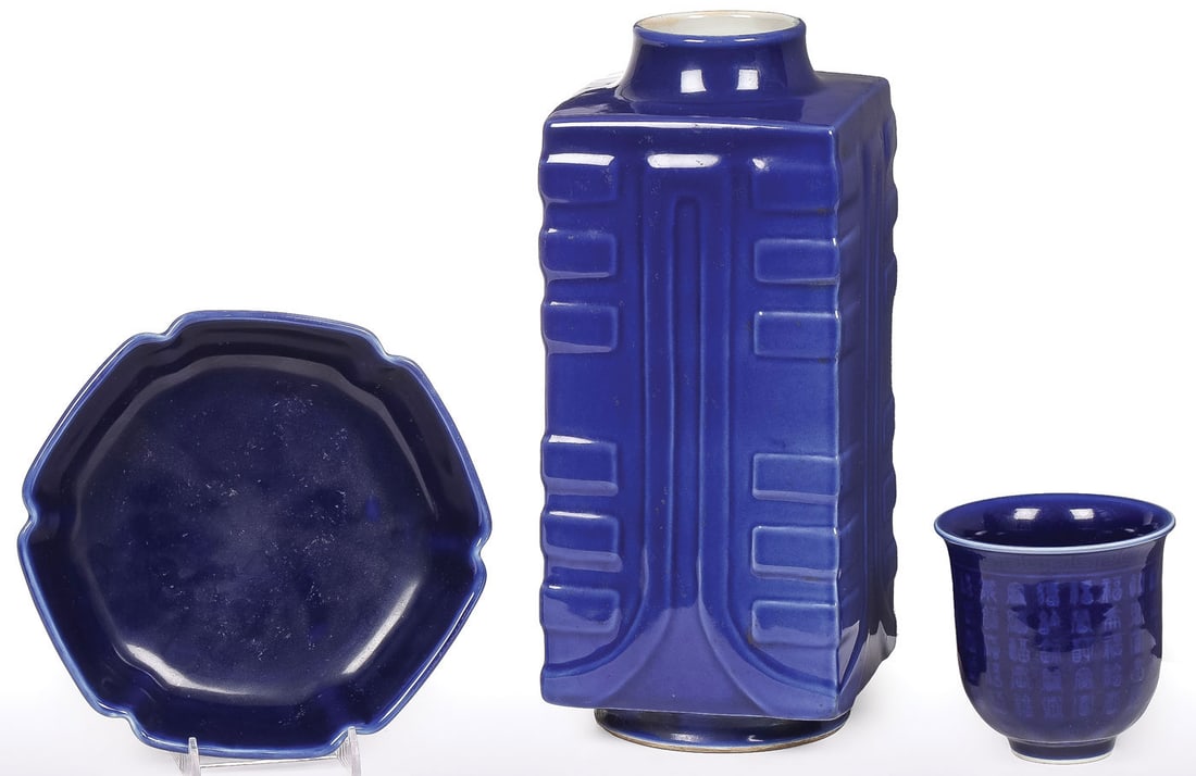 3 CHINESE COBALT GLAZED VESSELS: 3 CHINESE COBALT GLAZED VESSELS. Comprising a cobalt blue glazed Cong-form vase, the underside exhibiting incised mark, "Made during the Guangxu period of the Qing dynasty," height 11.75 inches (29.8c