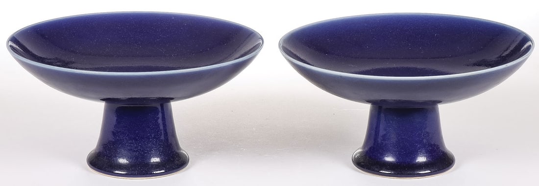PAIR CHINESE GLAZED FOOTED BOWLS: PAIR CHINESE GLAZED FOOTED BOWLS. Comprising a pair of matching Chinese cobalt blue glazed footed bowls. The underside of each exhibiting a blue underglaze six-character mark which translates to, "Mad