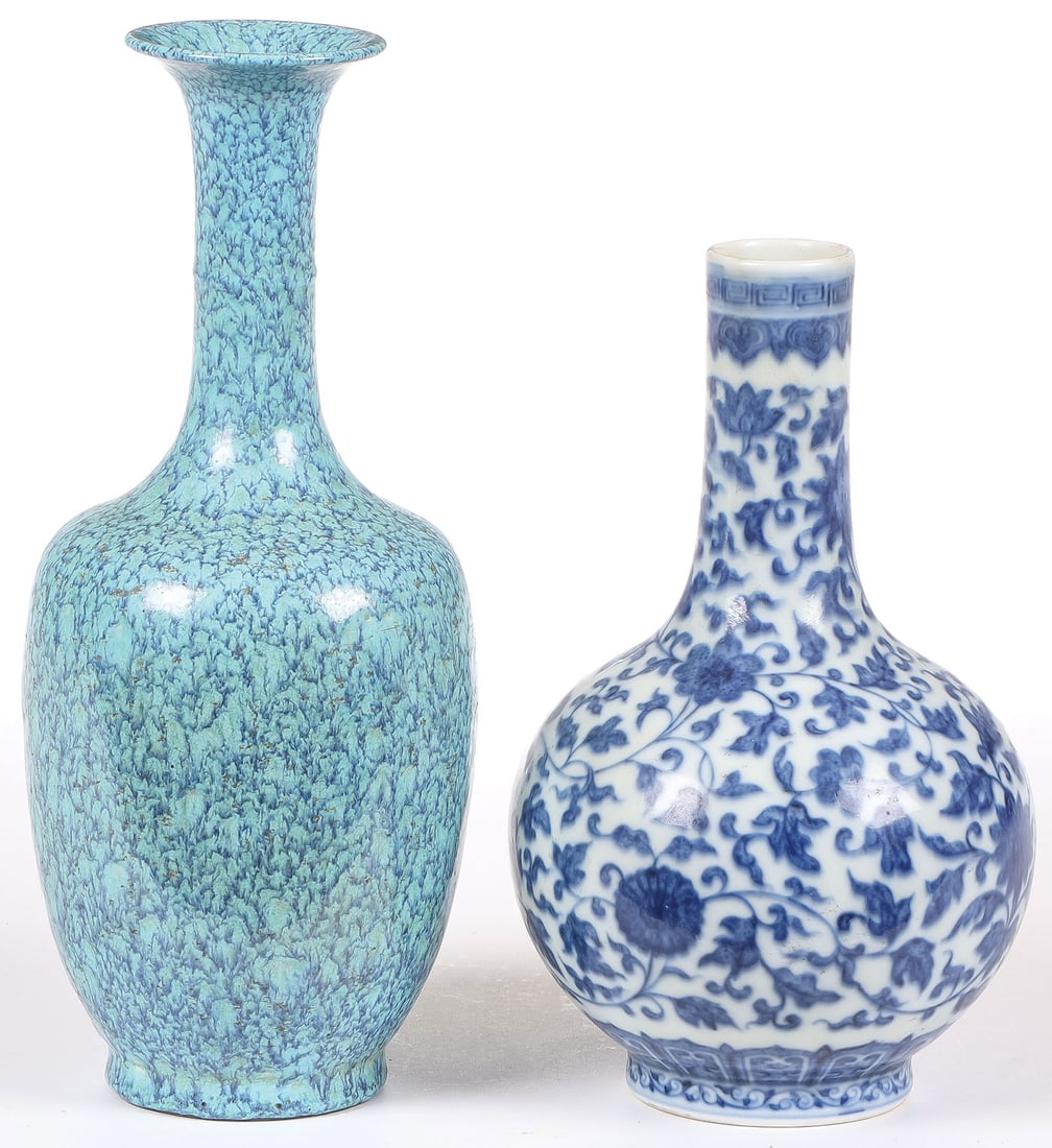 PR CHINESE PORCELAIN VASES: PR CHINESE PORCELAIN VASES. Comprising a Chinese Jun glazed long neck flared rim vase. The underside bearing incised mark, of the Qing dynasty. Height 9.5 inches (24.1cm). Together with a blue and whi