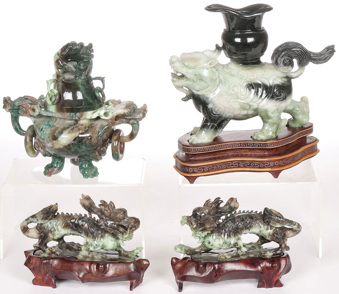 GOOD CHINESE CARVED JADE GROUP: GOOD CHINESE CARVED JADE GROUP. Comprising a finely carved jade foo lion with urn and resting on an ornate conforming wood base, a carved jade footed censer with dragon mask ring handles and dragon fi