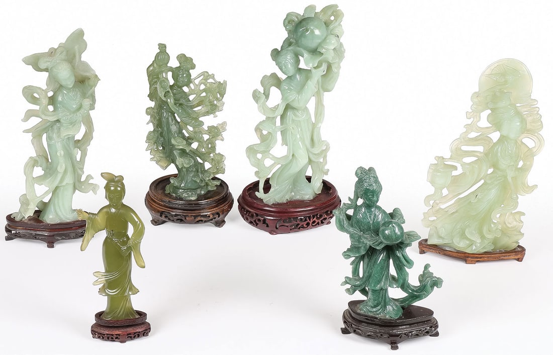 6 CHINESE CARVED HARDSTONE MAIDENS: 6 CHINESE CARVED HARDSTONE MAIDENS. Comprising a group of six finely carved hardstone maidens, including one jade example, each finely carved in full round, of good proportions and anatomy, with flowi