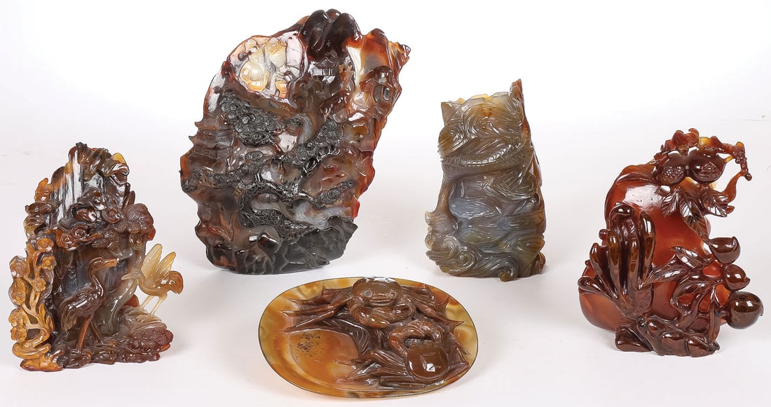 EXCELLENT CHINESE CARVED AGATE GROUP: EXCELLENT CHINESE CARVED AGATE GROUP. Comprising five individual carved agate pieces, including a large boulder carved with mountainous landscape depicting temples, animals, and two figures at the top