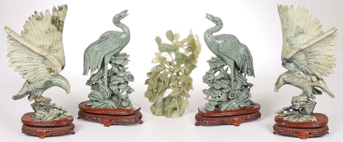 CHINESE CARVED HARDSTONE BIRDS: CHINESE CARVED HARDSTONE BIRDS. Comprising two matching pairs of opposing eagles and cranes on conforming wood stands, and a carved hardstone tree incorporating various birds and a deer at base.