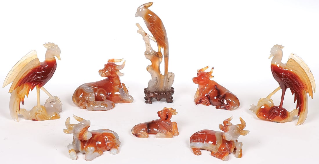 GOOD CHINESE CARVED AGATE GROUP: GOOD CHINESE CARVED AGATE GROUP. Comprising eight individual carved agate animal figures, including a pair of matching exotic birds and horned cattle. Greatest measurement 7.25 inches (18.5cm).