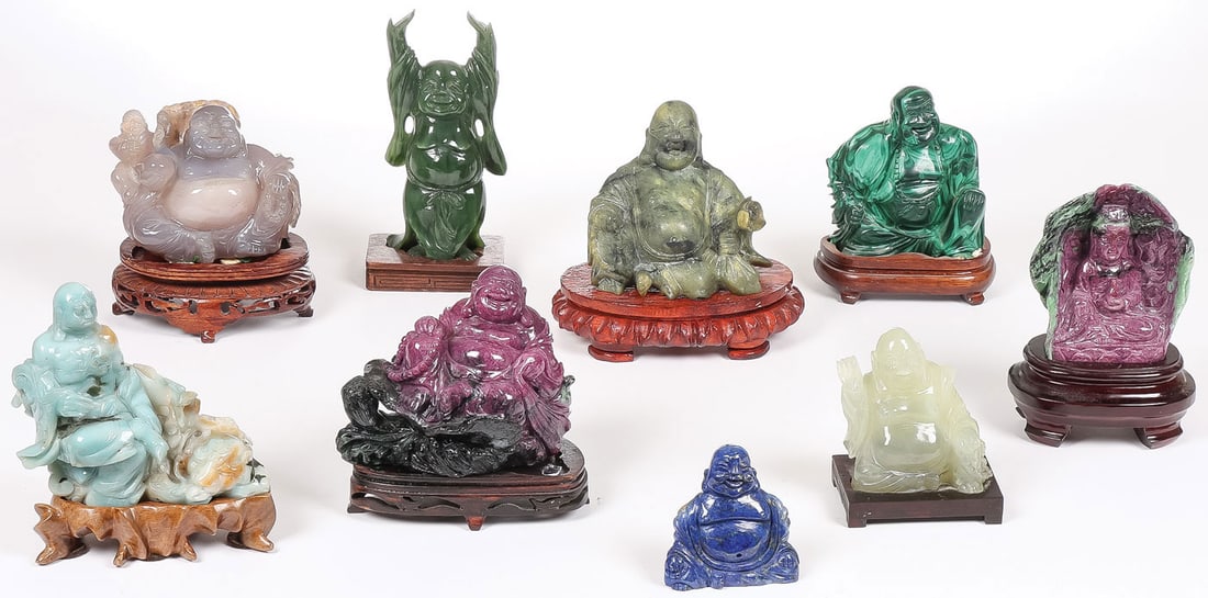 9 CHINESE CARVED JADE & HARDSTONE BUDDHAS: 9 CHINESE CARVED JADE & HARDSTONE BUDDHAS. Comprising a good and diverse offering including four carved jade Buddhas, two ruby zoisite Buddhas, a malachite Buddha, a lapis lazuli Buddha, and a hardsto