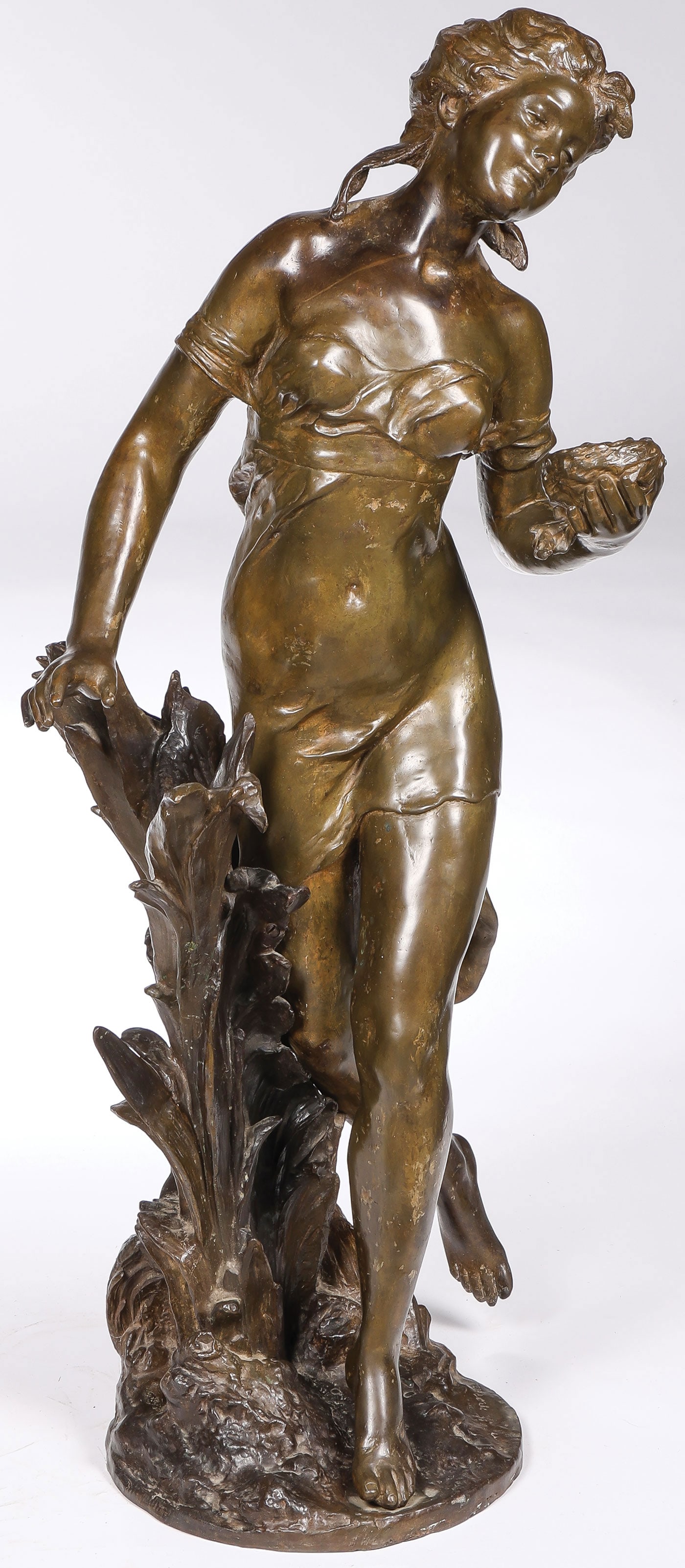 LARGE SIGNED FRENCH BRONZE, 19TH C: Auguste Moreau (French 1834-1917) Young Woman Holding Bird's Nest Bronze with brown patina Signed on base Moreau Height 37.75 inches (96cm) SHIPPING NOTICE: If you are n