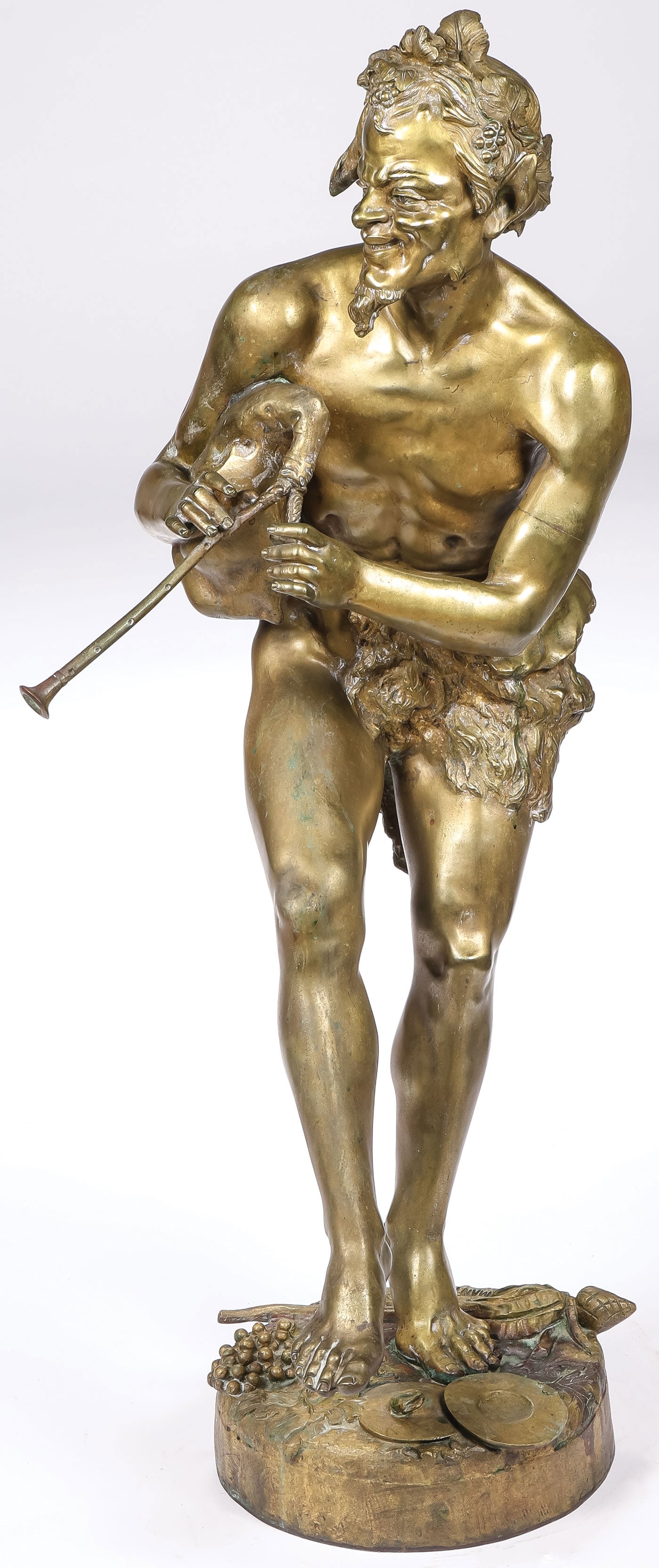 GOOD LARGE SIGNED BRONZE, 19th C: Karl Thylmann (German 1888-1916) Bacchus with Flutes Bronze Signed on base Thylmann Height 36.5 inches (93cm) SHIPPING NOTICE: If you are not using the Live Auctioneers