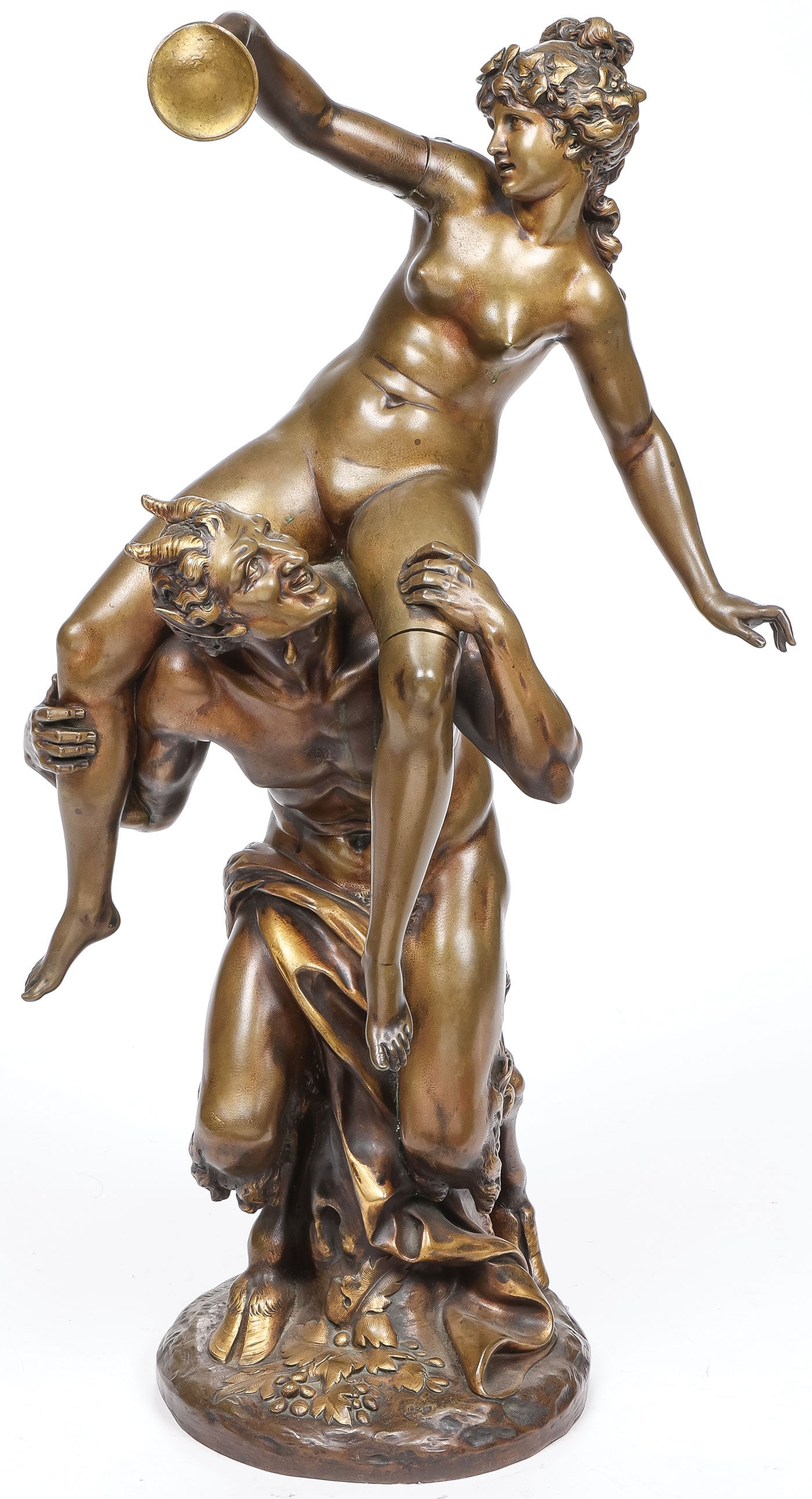 GOOD 19TH CENTURY FRENCH BRONZE: After Claude Michel Clodion (French 1738-1814) Nymph and Satyr Bronze with gilt and brown patina Signed on base Clodion, with foundry mark of MAISON MARNYHAC 1 rue De La Paix Height 22.25 inches (56.5