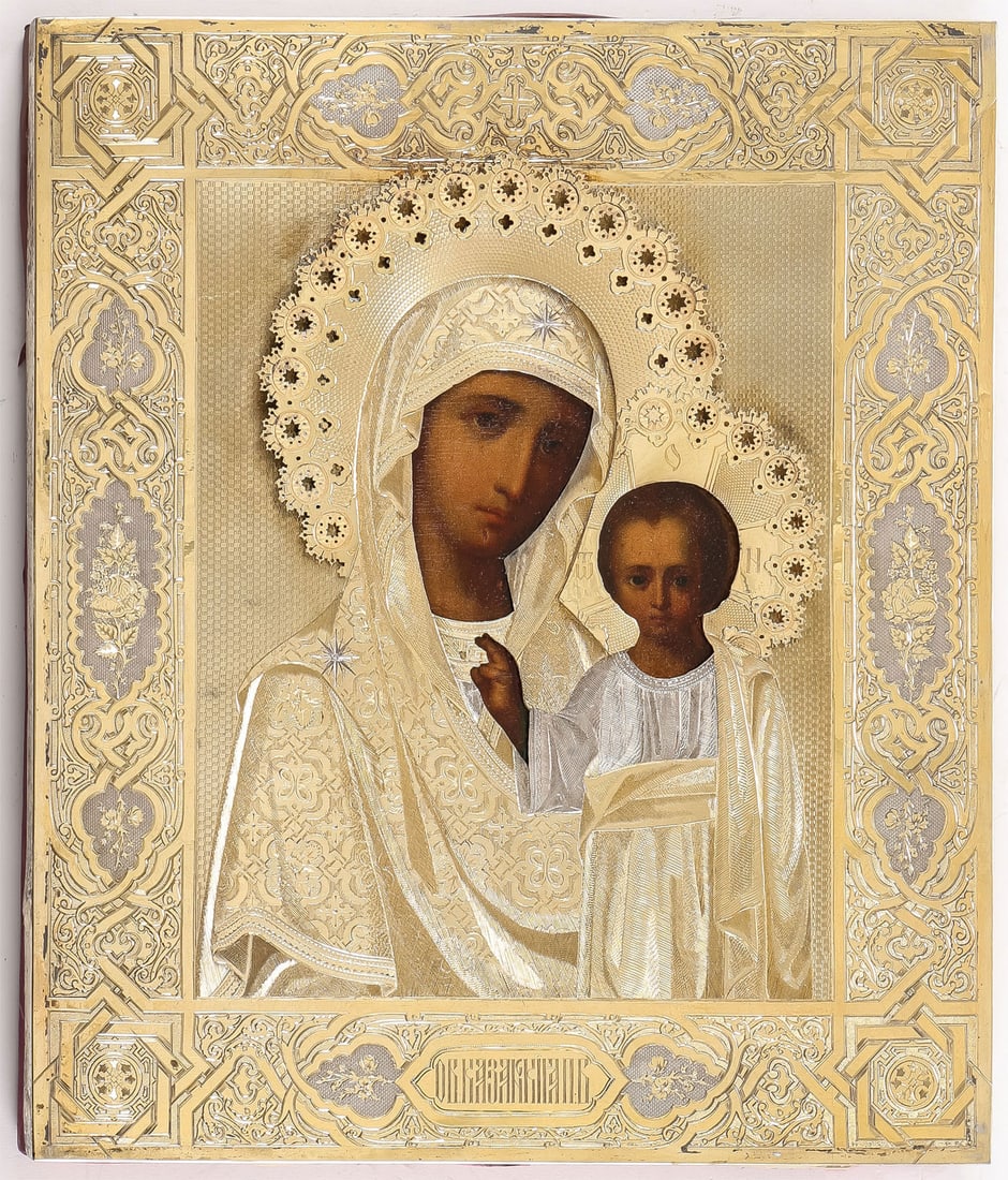 RUSSIAN ICON, OVCHINNIKOV, DATED 1874: RUSSIAN ICON, OVCHINNIKOV, DATED 1874. Comprising a fine Russian icon of the Kazan Mother of God, overlaid with an ornately and extensively engraved silver-gilt oklad, hallmarked Moscow, dated 1874, C