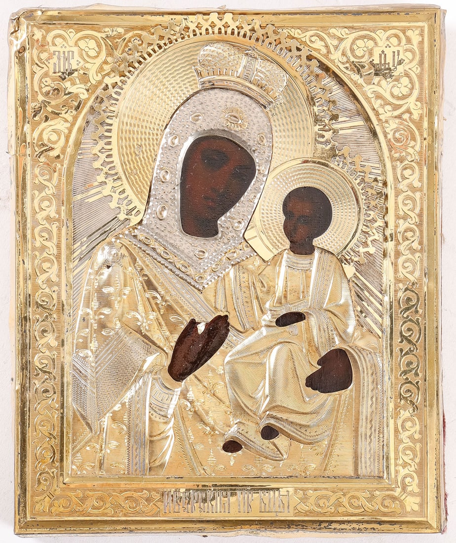 A RUSSIAN SILVER-GILT ICON, MOSCOW, 1896-1908: A RUSSIAN SILVER-GILT ICON, MOSCOW, 1896-1908. Comprising a very fine Russian icon of the Iverskaya Mother of God, overlaid with a fine machine-engraved silver-gilt and repousse oklad, hallmarked Mosc