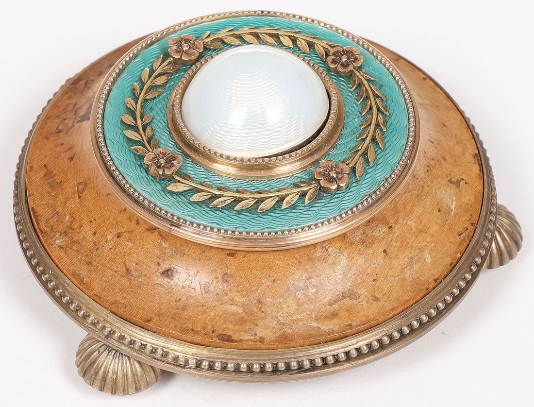 FABERGE SILVER-GILT & ENAMEL BELL PUSH: FABERGE SILVER-GILT & ENAMEL BELL PUSH. Of circular form on three fluted half ball feet, the body of Karelian birch and the top surface banded in translucent blue enamel over a guilloche ground set wi