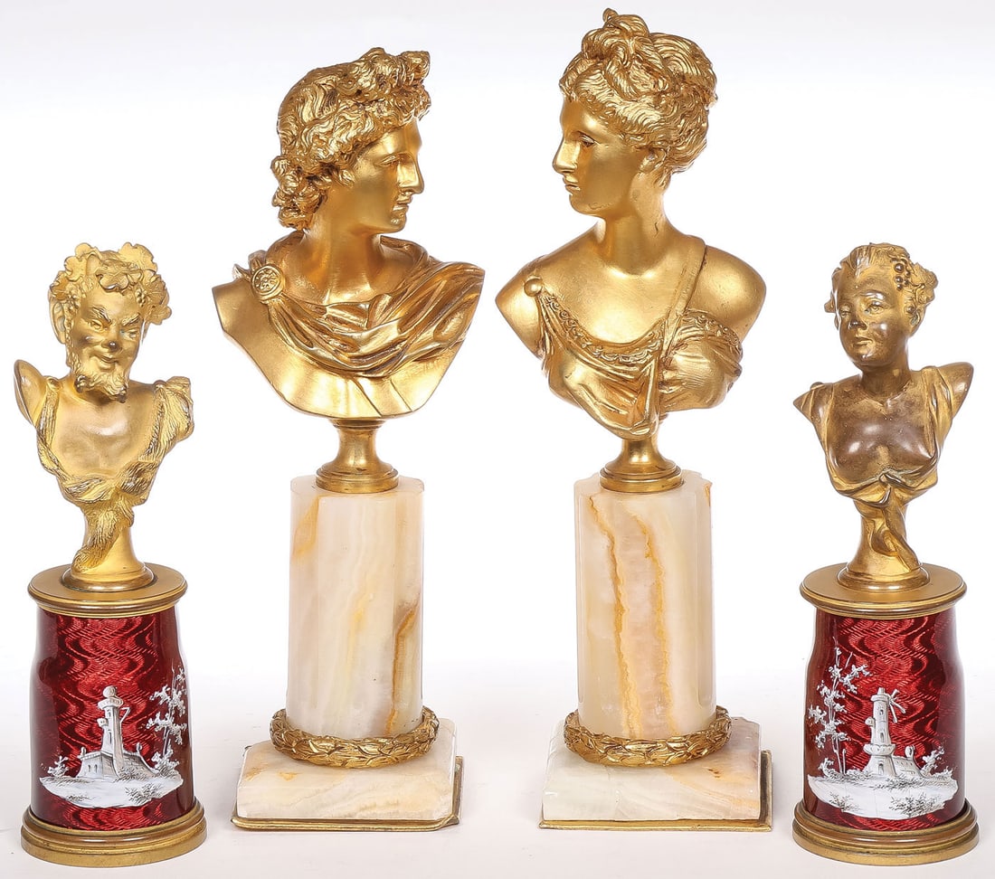 FOUR FRENCH GILT BRONZE BUSTS: FOUR FRENCH GILT BRONZE BUSTS. Comprising a pair of matching gilt bronze busts including busts of Apollo and Diana, each on fluted carved alabaster columns (some losses to base on one) with gilt laure