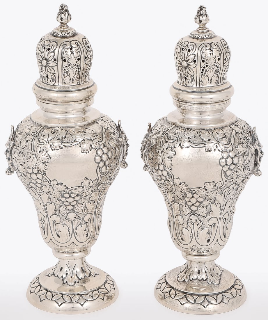 PR OF ENGLISH STERLING SILVER CASTERS, 1914: PR OF ENGLISH STERLING SILVER CASTERS, 1914. Comprising a very fine matching pair of ornately decorated English sterling silver sugar casters, each with maker's mark for George Nathan & Ridley Hayes,