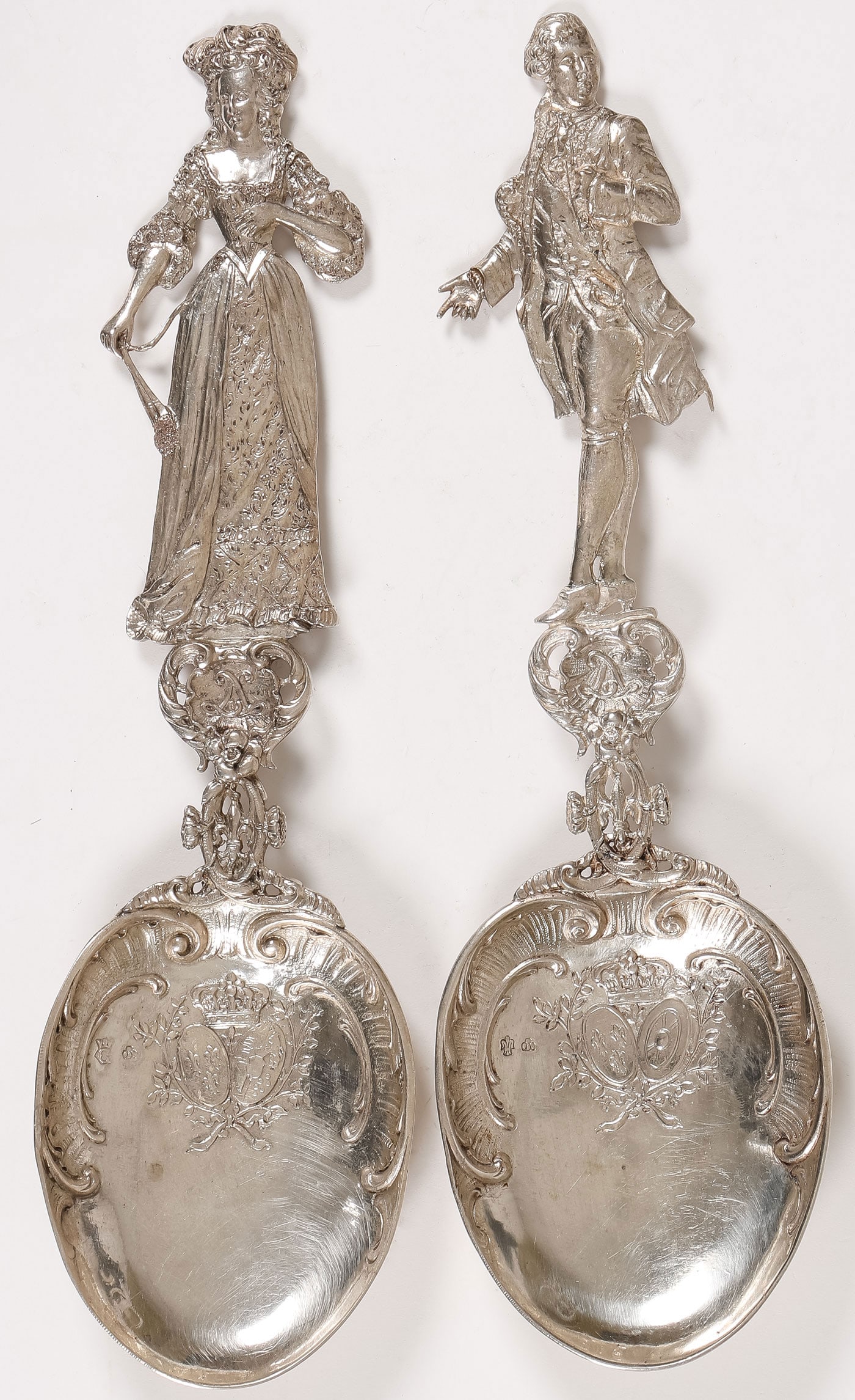LARGE ENGLISH SILVER SERVING SPOONS, C. 1898: LARGE ENGLISH SILVER SERVING SPOONS, C. 1898. Comprising a pair of large, ornate, and finely modeled serving spoons depicting Marie Antoinette and Louis XVI, with London hallmarks, date mark 1898,