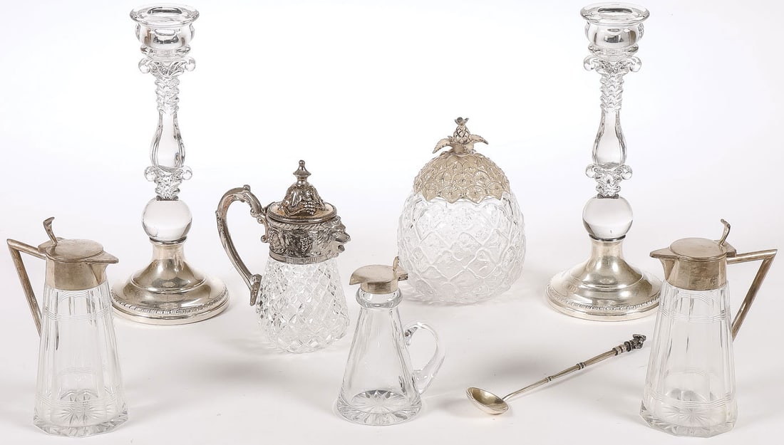 SILVER MOUNTED CRYSTAL GROUP: SILVER MOUNTED CRYSTAL GROUP. Comprising 6 silver mounted crystal pieces, including a pair of weighted sterling silver mounted crystal candlesticks, a Gorham sterling covered crystal pineapple jar, an