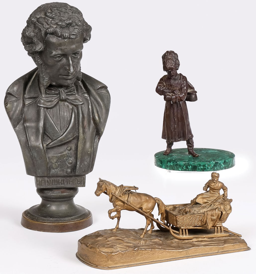 RUSSIAN SCULPTURAL GROUP, C. 1880: RUSSIAN SCULPTURAL GROUP, C. 1880. Comprising a cast metal bust of Pushkin, height 11.75 inches (30cm); a finely detailed gilt-metal group of a sleigh driver (hunter) with gun and dog, length 8.25