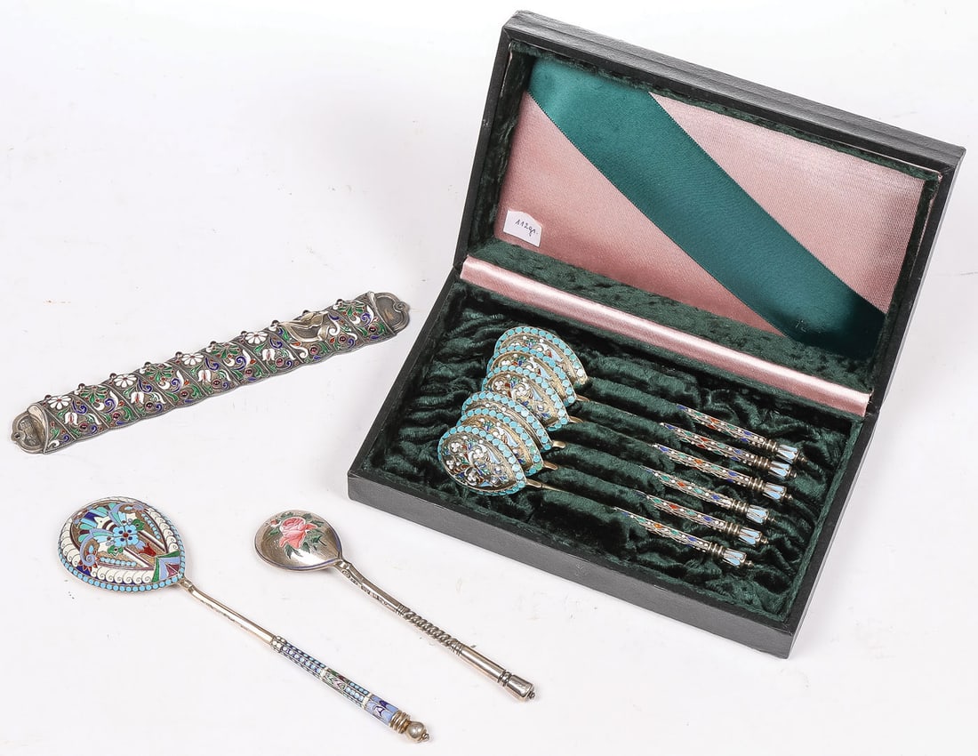 RUSSIAN SILVER AND ENAMEL GROUP, C. 1900: RUSSIAN SILVER AND ENAMEL GROUP, C. 1900. Comprising a cased set of six silver-gilt and enamel teaspoons, hallmarked Moscow circa 1890, Cyrillic maker's mark E.P. Length 5 inches (12.7cm). Together wi