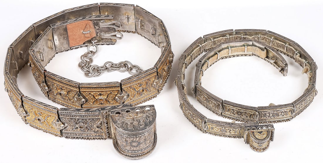 2 RUSSIAN CAUCASIAN SILVER CEREMONIAL BELTS: 2 RUSSIAN CAUCASIAN SILVER CEREMONIAL BELTS. Comprising two heavy and ornate silver-gilt and niello ceremonial or wedding belts, each of traditional design and construction with a large domed buckle