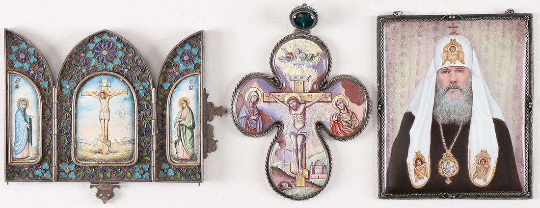 THREE RUSSIAN ENAMELED ICONS: THREE RUSSIAN ENAMELED ICONS. Comprising a silver and enamel triptych icon, the central arched panel depicting the Crucified Christ flanked on the left wing by the Virgin and on the right wing by St. 