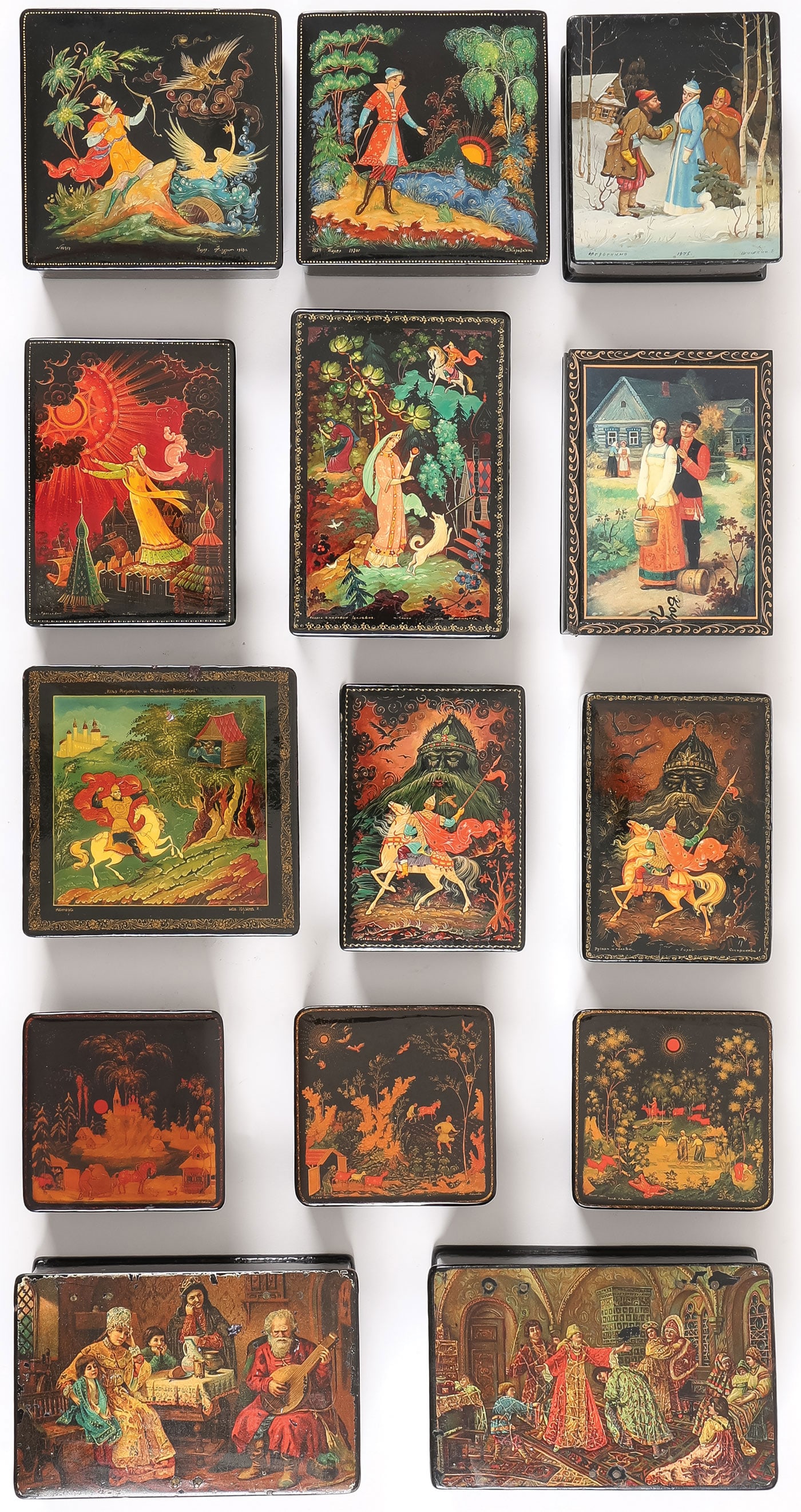 14 RUSSIAN LACQUER BOXES: 14 RUSSIAN LACQUER BOXES. Including hand painted examples depicting classic fairytale scenes, including examples from the villages of Palekh, Fedoskino, Mstyora, and Kholui. Greatest length 6.25