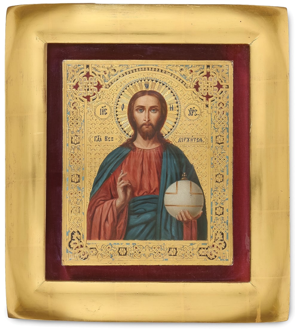 RUSSIAN ICON OF CHRIST, C. 1890: RUSSIAN ICON OF CHRIST, C. 1890. Comprising an icon of Christ as the Lord Almighty, realistically rendered on an ornate incised gilt ground painted in faux enamel and contained in a large, glazed