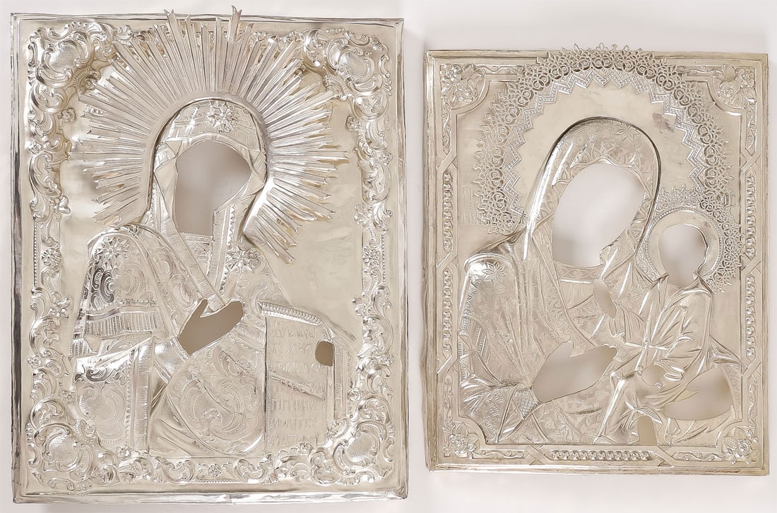 PAIR OF FINE ICON COVERS: PAIR OF FINE ICON COVERS. Comprising a pair of finely repousse and chased silver plated icon covers (oklads). The largest example being for an icon of The Mother of God from a three-piece Deisis