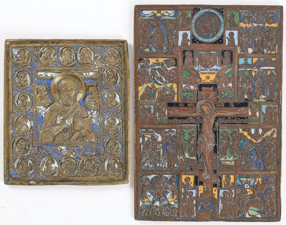 TWO RUSSIAN CAST COPPER & ENAMEL ICONS: TWO RUSSIAN CAST COPPER & ENAMEL ICONS. Including a very rare and finely cast rectangular icon depicting the crucified Christ at center surrounded by eight major Feast Days and at top center the Old