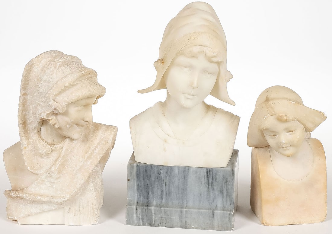 3 ITALAIN ALABASTER CARVED BUSTS C 1915-1930: 3 ITALAIN ALABASTER CARVED BUSTS C 1915-1930. Comprising a smiling young girl with knitted scarf and hat, a bust of a Dutch girl, and another as shown. None signed. Greatest height 10.25 inches