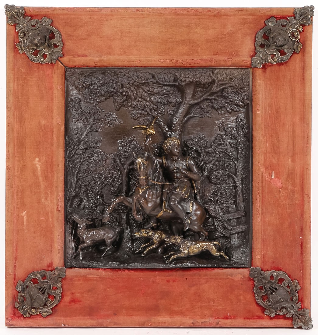 LARGE VICTORIAN HUNTING PLAQUE: LARGE VICTORIAN HUNTING PLAQUE. Comprising a large and impressive high-relief polychrome spelter ware plaque depicting a young falconer on a rearing horse within a wooded landscape, and beneath him