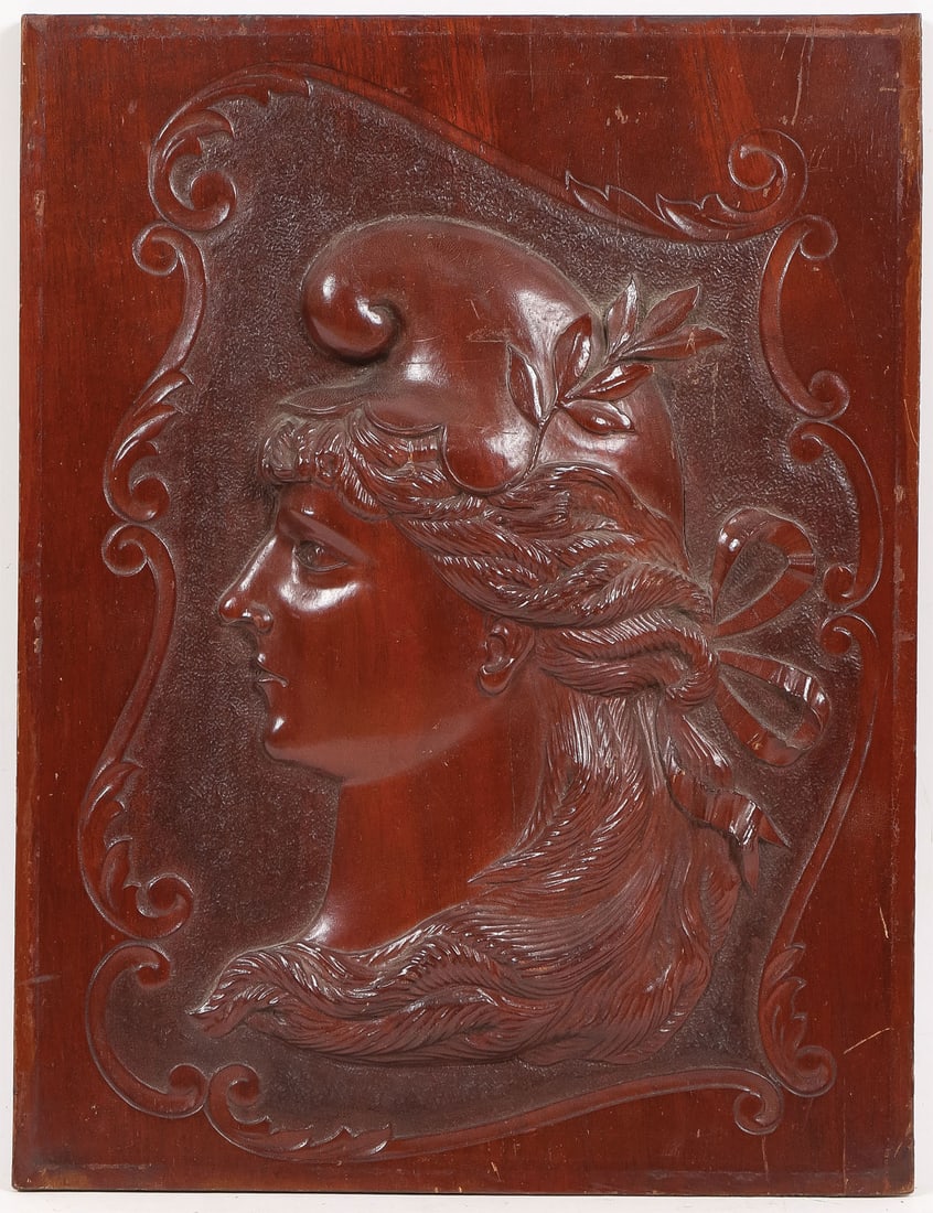 CARVED MAHOGANY BUST OF LIBERTY, C. 1880: CARVED MAHOGANY BUST OF LIBERTY, C. 1880. Comprising a fine bas-relief carved bust of Lady Liberty, 16.75 x 12.75 inches (42.5 x 32.4cm). SHIPPING NOTICE: If you are not using the Live Auctioneers