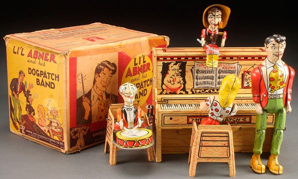 A UNIQUE ART LIL ABNER DOGPATCH TOY BAND, CIRCA 1945.: A UNIQUE ART LIL ABNER DOGPATCH BAND, CIRCA 1945. With original box. Box length 7.5 inches (19 cm).