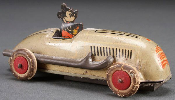 A SCARCE 1936 MICKEY MOUSE RACE CAR TIN WIND UP.: A SCARCE 1936 MICKEY MOUSE RACE CAR TIN WIND UP. Marked Made in U.S.A. Length 4 inches (10 cm).