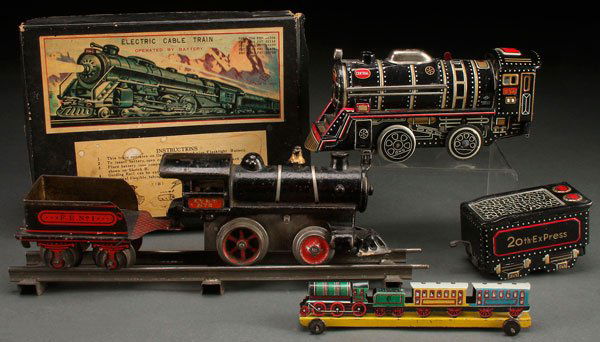AN IVES NO. 2 CAST IRON TOY LOCOMOTIVE: AN IVES NO. 2 CAST IRON LOCOMOTIVE, EARLY 20TH CENTURY. With tin litho tender. Together with a Japan electric cable train in box and a tin litho penny toy train. Largest 9.5 inches (24 cm).