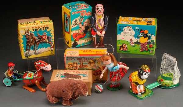 A GROUP OF FIVE JAPAN TIN WIND UP NOVELTY TOYS: A GROUP OF FIVE JAPAN TIN WIND UP NOVELTY TOYS, MID 20TH CENTURY. All mint condition in original boxes. Comprising a Racing Trotter, a Climbing Pirate, a Bear Golfer, a Walking Bear and a Suzy Bouncin