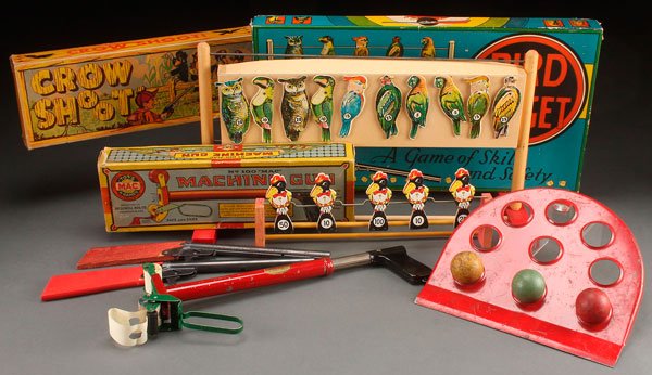 A BIRD TARGET AND CROW SHOOT ARCADE GAME TOY: A BIRD TARGET AND CROW SHOOT ARCADE GAME, EARLY TO MID 20TH CENTURY. Comprising a boxed Milton Bradley Bird Target with Daisy pop gun in near mint condition, a Jaymar Crow Shoot shooting game in origi