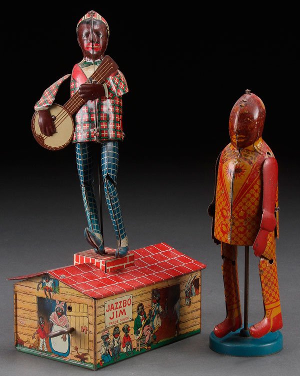 A BLACK AMERICANA UNIQUE ART TIN LITHO TOY JAZZBO JIM: A BLACK AMERICANA UNIQUE ART TIN LITHO JAZZBO JIM WIND UP TOY MINSTREL, EARLY 20TH CENTURY. Together with a Lindstrom "Shufflin' Sam". Largest height 10.25 inches (26 cm).