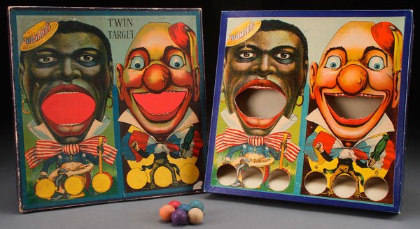 A BLACK AMERICANA MILTON BRADLEY TWIN TARGETS BALL TOSS: A BLACK AMERICANA MILTON BRADLEY TWIN TARGETS BALL TOSS GAME, CIRCA 1900. Paper lithograph with original box and cover. 13 inches (33 cm) square.