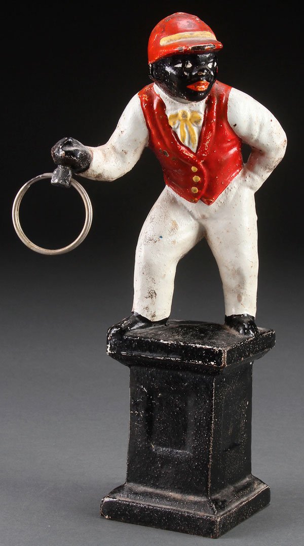 A BLACK AMERICANA MINIATURE CAST IRON LAWN JOCKEY Sep 17, 2013