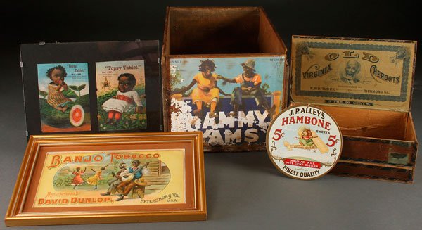 A FIVE PIECE BLACK AMERICANA VINTAGE ADVERTISING GROUP: A FIVE PIECE BLACK AMERICANA ADVERTISING GROUP, LATE 19TH/EARLY 20TH CENTURY. Comprising a Mammy Yams wood crate, a framed Banjo Tobacco label, a Hambone Sweets pendant sign, an Old Virginia Cheroots 