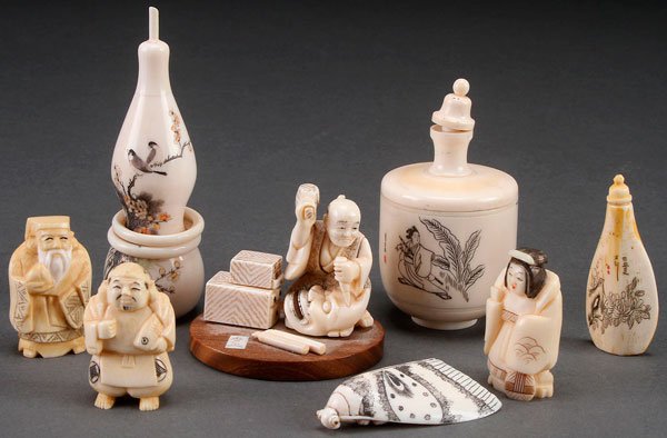 AN EIGHT PIECE GROUP OF ORIENTAL CARVED IVORY: AN EIGHT PIECE GROUP OF ORIENTAL CARVED IVORY. Including three Chinese snuff bottles, one of double gourd form, a Japanese moth form netsuke, three figures of immortals, and a fine Japanese okimono of