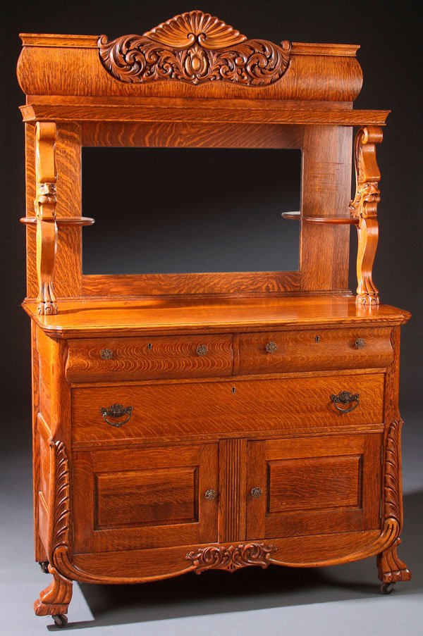 A VICTORIAN OAK SIDEBOARD, CIRCA 1900.