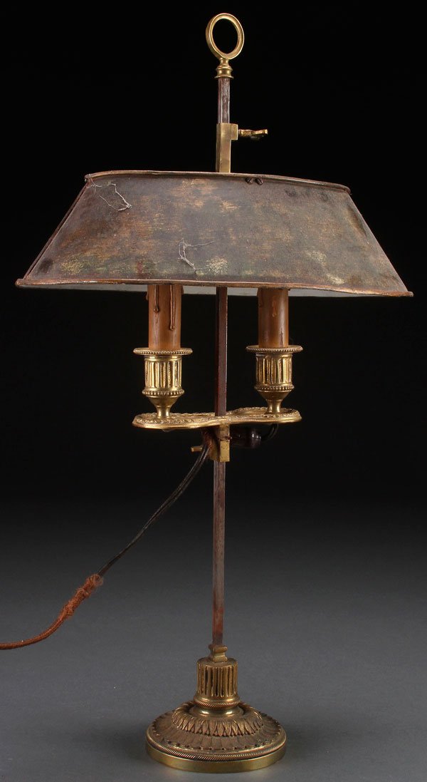 A FRENCH LOUIS XVI STYLE DOUBLE CANDLE STAND: A FRENCH LOUIS XVI STYLE DOUBLE CANDLE STAND, CIRCA 1900. Gilt bronze with adjustable height and shade. Electrified. Height 22.5 inches (57 cm).