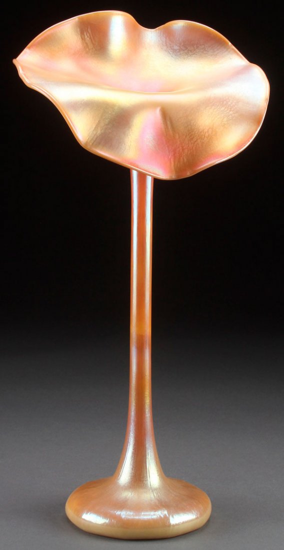 A GOLD IRIDIZED ART GLASS JACK IN THE PULPIT VASE: A GOLD IRIDIZED ART GLASS JACK IN THE PULPIT VASE, LAST QUARTER 20TH CENTURY. In calcite type glass with iridized gold finish, ground pontil spuriously inscribed L.C. Tiffany Favrille. Height 18 inche