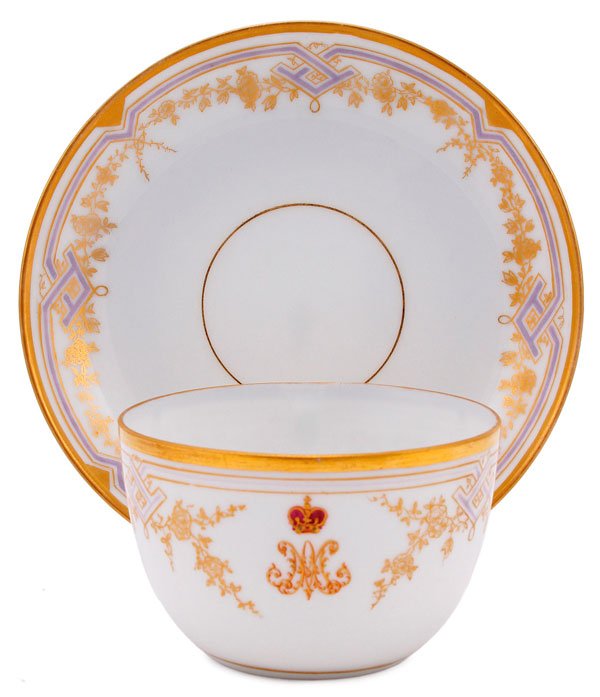 IMPERIAL RUSSIAN PORCELAIN CUP & SAUCER: A RUSSIAN IMPERIAL PORCELAIN MANUFACTORY CUP & SAUCER FROM THE LIVADIA PALACE SERVICE, PERIOD OF ALEXANDER III – NICHOLAS II. Comprising a saucer, 5.6 inches (14.4 cm), with gilt strapwork, floral g