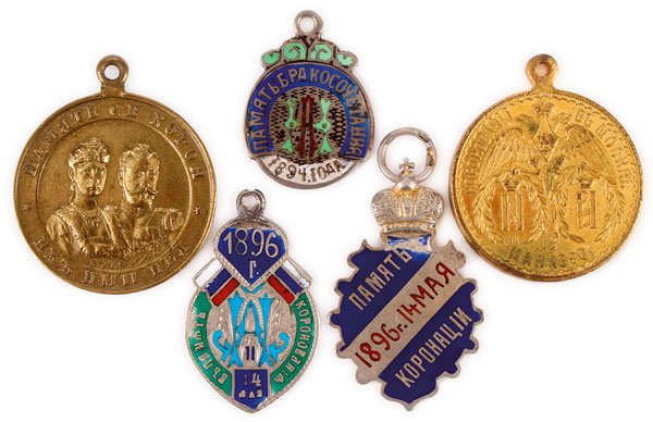 GROUP OF IMPERIAL RUSSIAN JETTONS AND MEDALLIONS: A GROUP OF IMPERIAL RUSSIAN JETTONS AND MEDALLIONS, CIRCA 1896. Comprising three silver enameled Jettons, one commemorating the ascent to the throne of Nicholas II in 1894, the other two commemorating