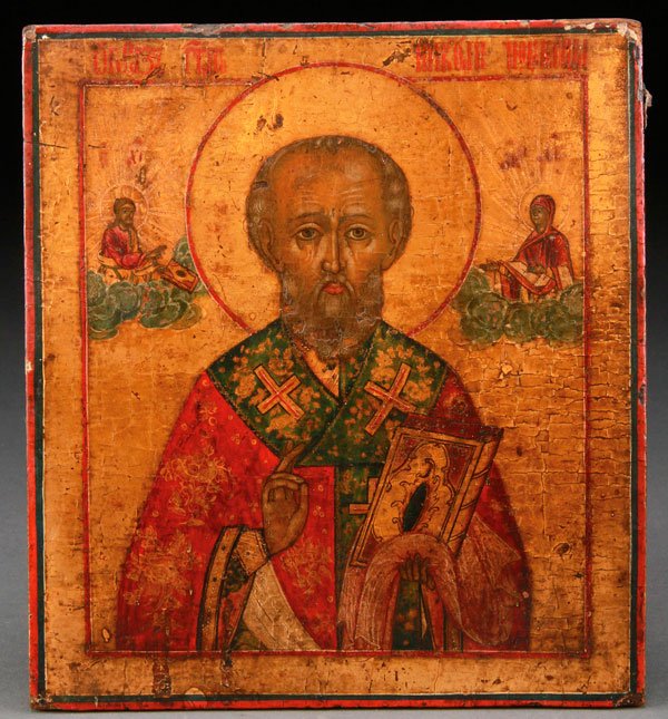 A RUSSIAN ICON OF SAINT NICHOLAS, CIRCA 1800: A RUSSIAN ICON OF SAINT NICHOLAS, CIRCA 1800. The verso with old hand inscribed label stating the icon was captured by English soldiers during the Crimean War. 8.25 inches x 7.25 inches (21 x 18.5 cm)