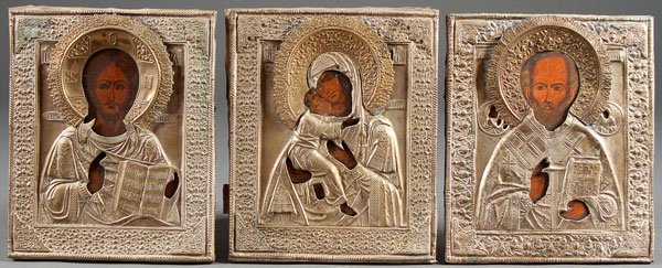 A GROUP OF THREE RUSSIAN ICONS, 19TH CENTURY: A GROUP OF THREE RUSSIAN ICONS, 19TH CENTURY. Comprising the Lord Almighty, the Vladimir Mother of God, and St. Nicholas. Each executed in the traditional old Byzantine style and each overlaid with a 