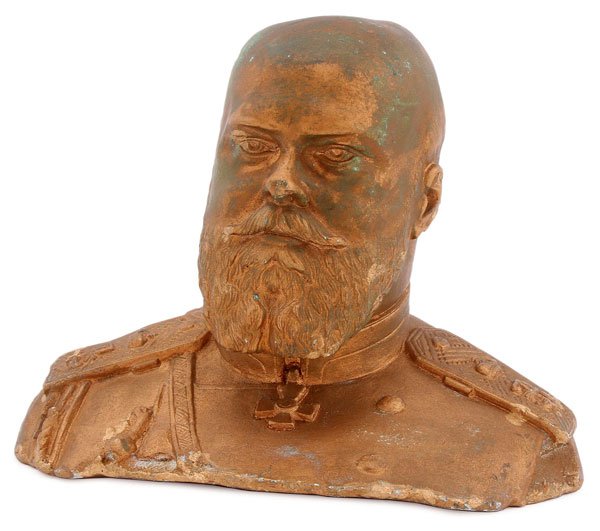 A RUSSIAN GILT PLASTER BUST OF TSAR ALEXANDER III: A RUSSIAN GILT PLASTER BUST OF TSAR ALEXANDER III, CIRCA 1900. Sculpted in full round, being a true likeness in military uniform. Underside with the Imperial cipher of Tsar Nicholas II. Height 6 inche