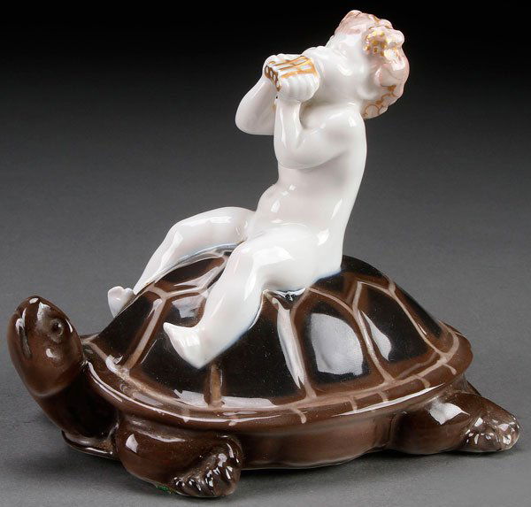 F. LIEBERMANN,ROSENTHAL "SCHILDKROTENPOST" FIGURE: A FERDINAND LIEBERMANN FOR ROSENTHAL "SCHILDKROTENPOST" PORCELAIN FIGURE, CIRCA 1913. Modeled as a young pan riding atop a tortoise. Impressed signature on base Ferdinand Liebermann with Rosenthal bac