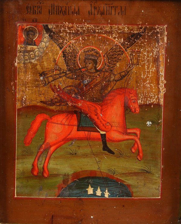 A RUSSIAN ICON OF THE ARCHANGEL MICHAEL, 19TH CEN: A RUSSIAN ICON OF THE ARCHANGEL MICHAEL, 19TH CENTURY. Contained in a glazed kiot with carved gilt liner. The icon 8.75 inches x 7.25 inches (22.5 x 28.5 cm), overall including shadowbox frame 18.5 in